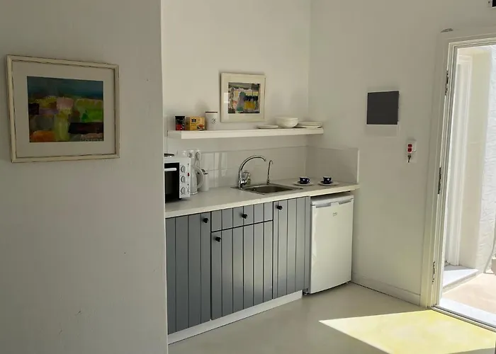 The Black Pig Апартаменты *